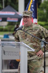 Army National Guard representative speaks at the podium