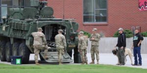 Army National Guard shows military vehicle to members of the public
