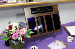 Plaque titled Hall of Honor Purple Heart Recipients and the list of names honored during this year's event.